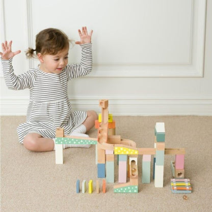 Classic World Wooden Marble Maze Blocks it’s a wooden marble run construction set for toddlers